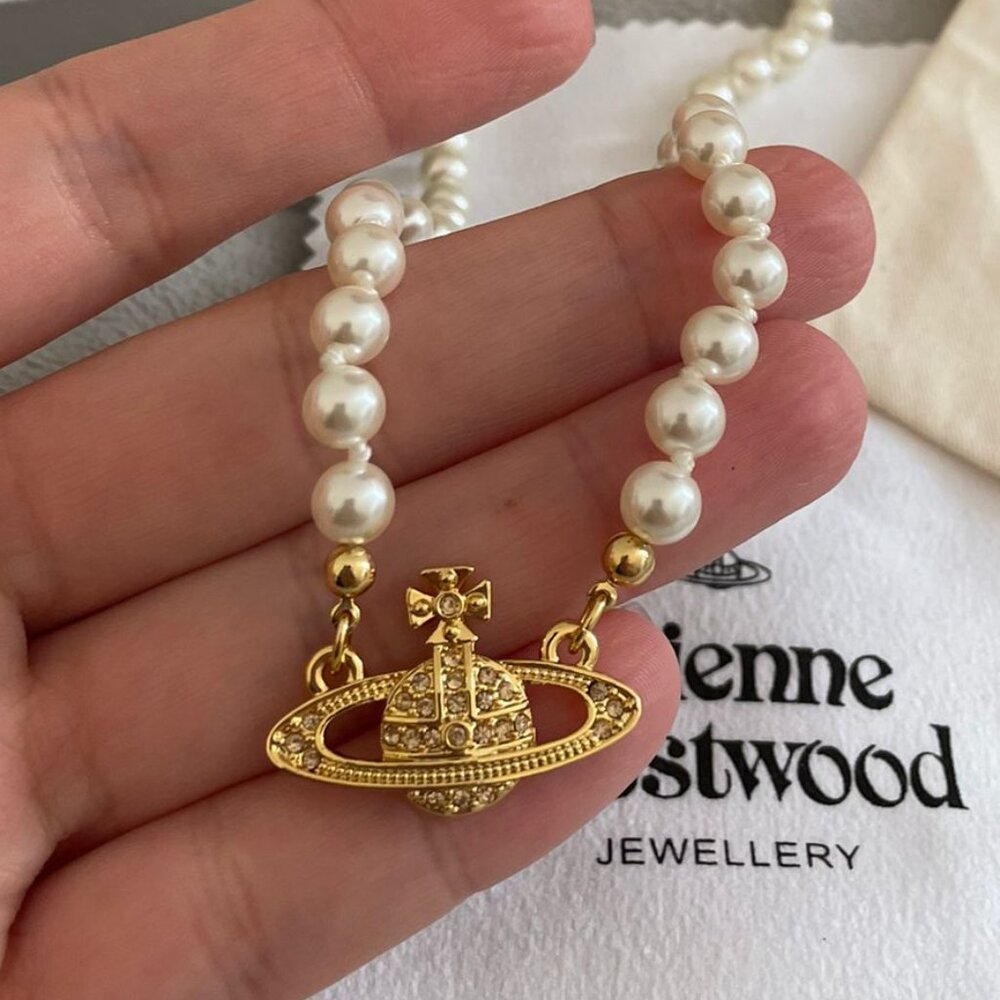 Authentic VIVIENNE WESTWOOD mini bas pearl choker gold metal